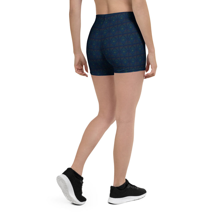 Back angle of GeOm festival shorts – visionary pattern meets modern ravewear.