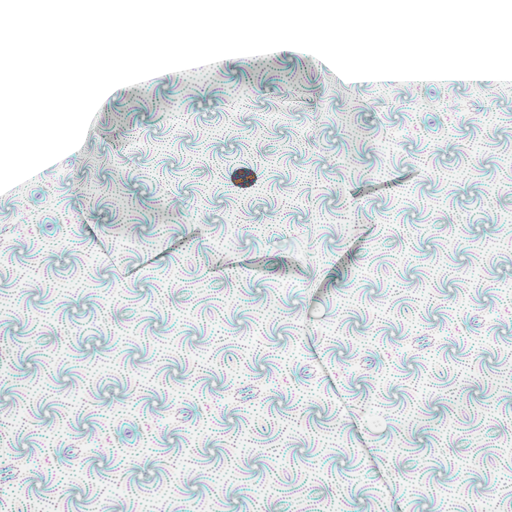 Close-up of collar on Dotadelic white/blue shirt – crisp sacred geometry with visionary festival vibes.
