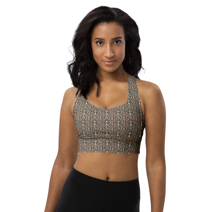 Model wearing Geomush psychedelic recycled sports bra – front view with sacred geometry pattern