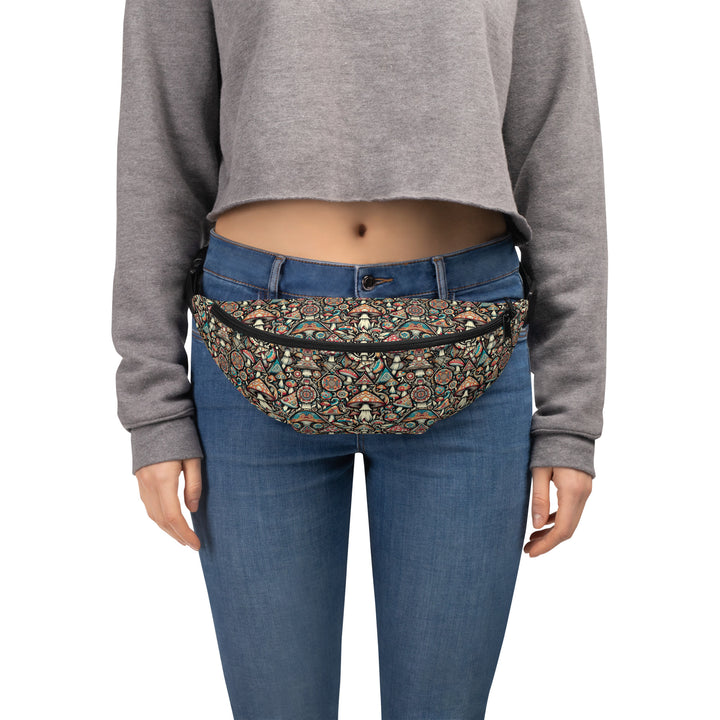Model wearing GeoMush waistbag – vibrant psychedelic mushroom pattern perfect for raves, festivals, and visionary streetwear