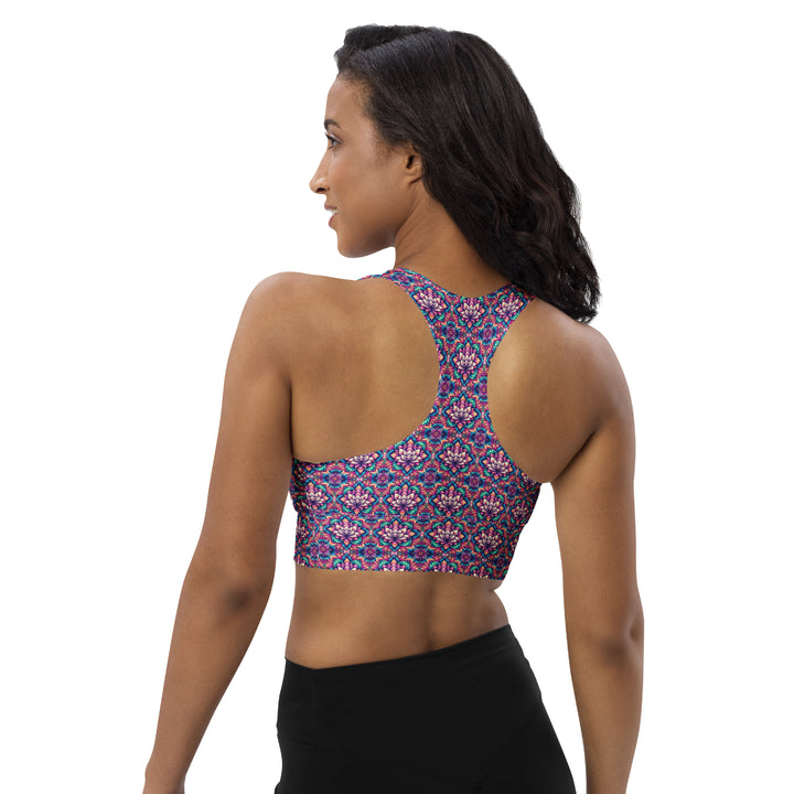 Back view of IllusionLotus longline recycled sports bra featuring sacred geometry design – sustainable rave and yoga gear.