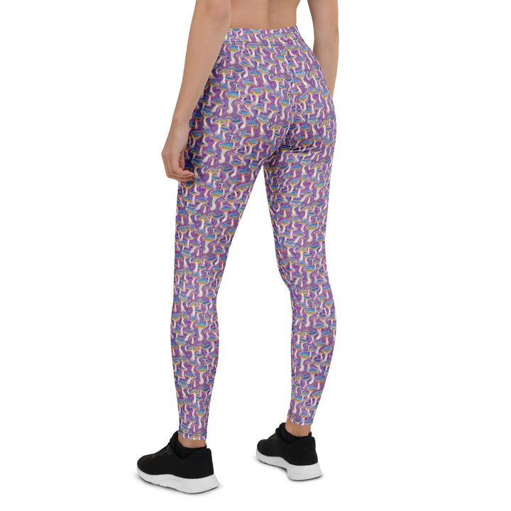 Back view of MushTrip leggings – sacred mushroom art and psychedelic pattern for active lifestyles.
