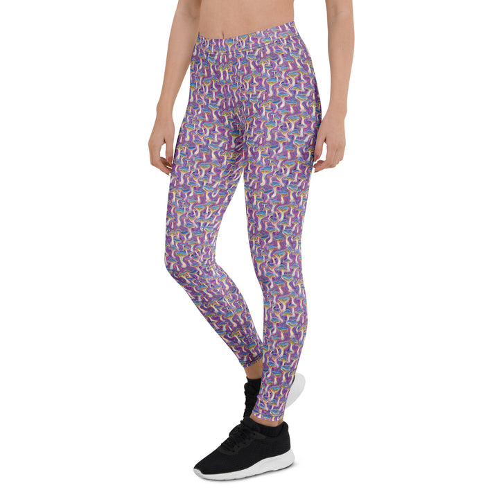 Left side of MushTrip leggings – comfortable psychedelic leggings with sacred mushroom energy.