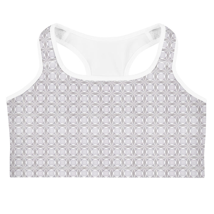 Flat lay front of Netra sports bra – sacred geometry print for yoga and activewear lovers