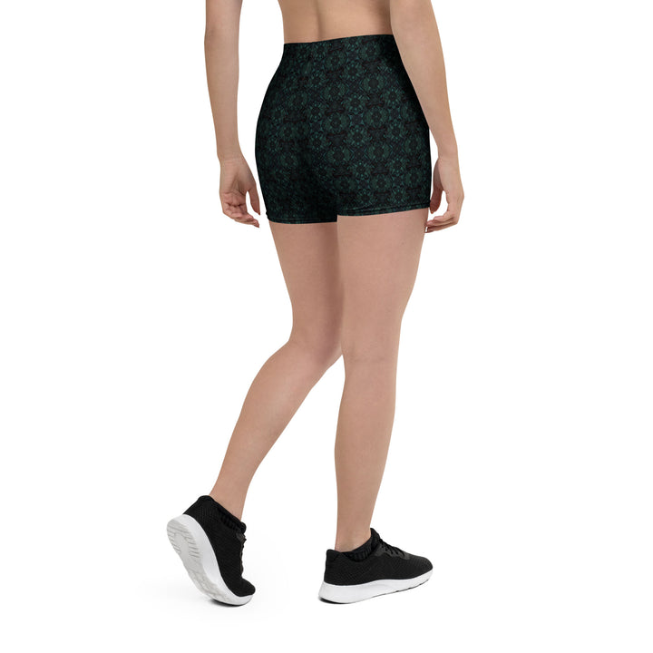 Back angle of Lumora festival leggings – visionary patterns meet high-performance activewear.