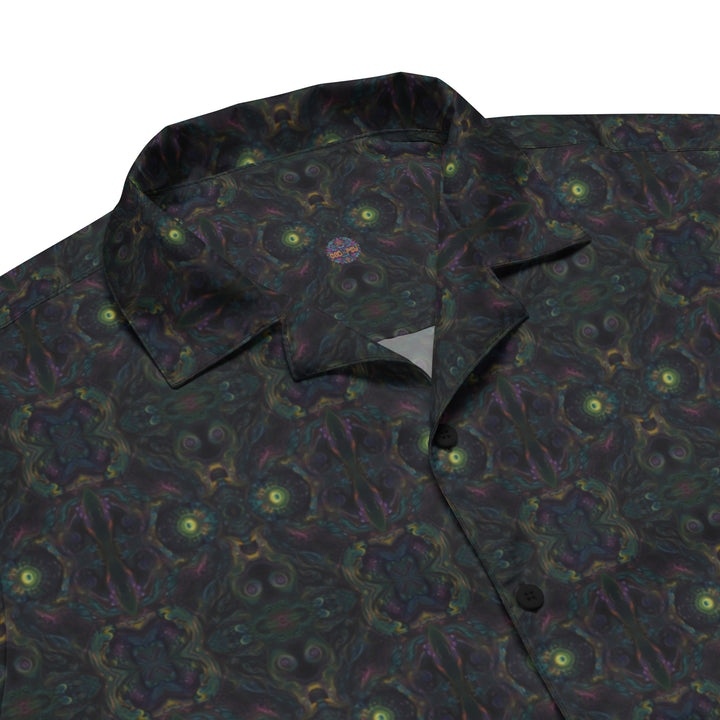 Close-up of collar – intricate details of the Psybot shirt with sacred tech-inspired patterns.