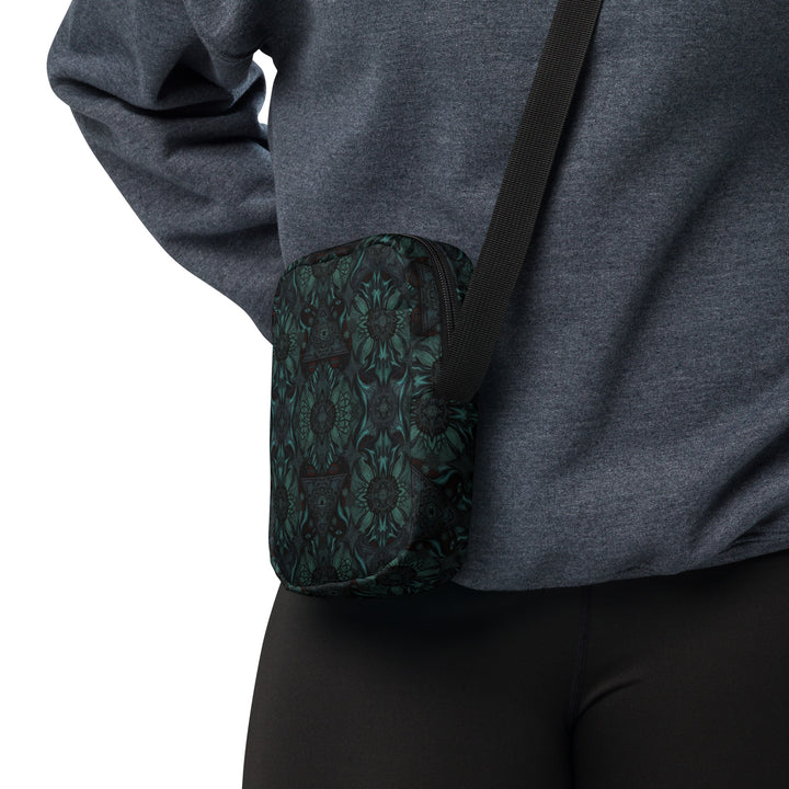 Lumora crossbody bag worn on the side – tribal psychedelic design for raves and visionary streetwear