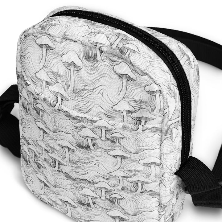 Angled shot of Mushforest crossbody festival bag – colorful geometric print with spiritual vibes