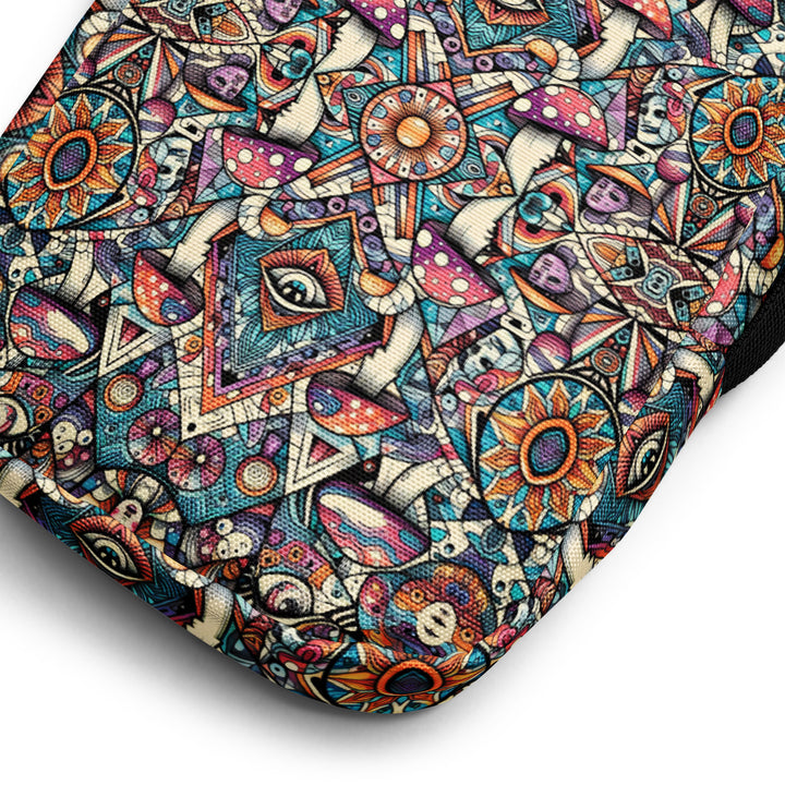 Close-up of Mushtribe bag fabric – sacred geometry print in vivid colors on dark background