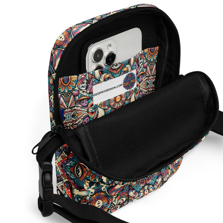 Interior of Mushtribe bag with phone and essentials – practical psychedelic crossbody for events