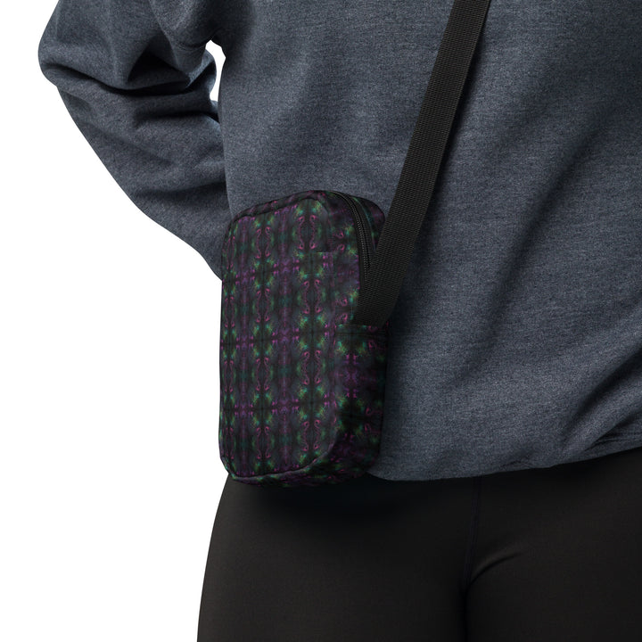 Nebulith crossbody bag worn on side – tribal psychedelic design for visionary streetwear and events