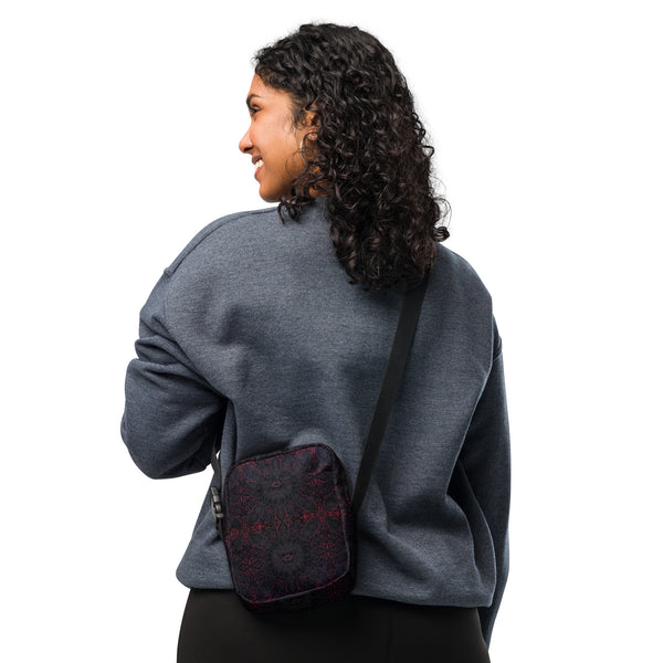 Person wearing THIRDEYE psychedelic crossbody bag – sacred geometry print for raves, travel & visionary fashion