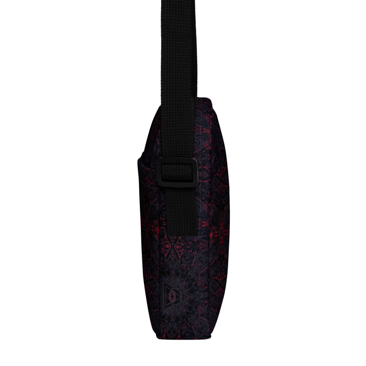 Left profile of THIRDEYE crossbody – light utility style with mind-expanding sacred print
