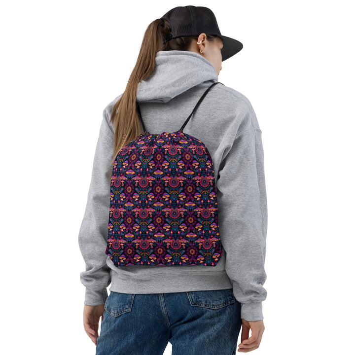 Model wearing PsyMush drawstring bag – perfect for raves, forest festivals, and sacred journeys