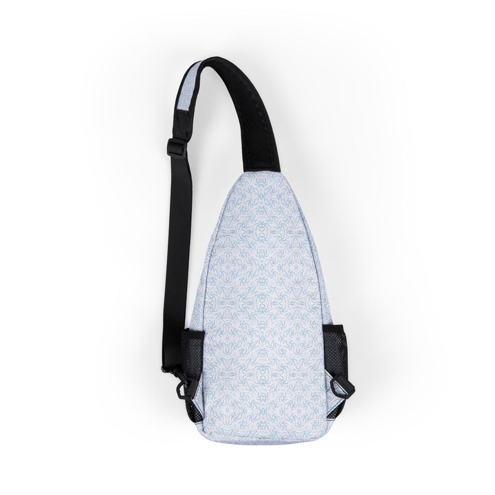 Back view of Dotadelic white and blue sling bag – tribal psychedelic pattern for festivals and travel