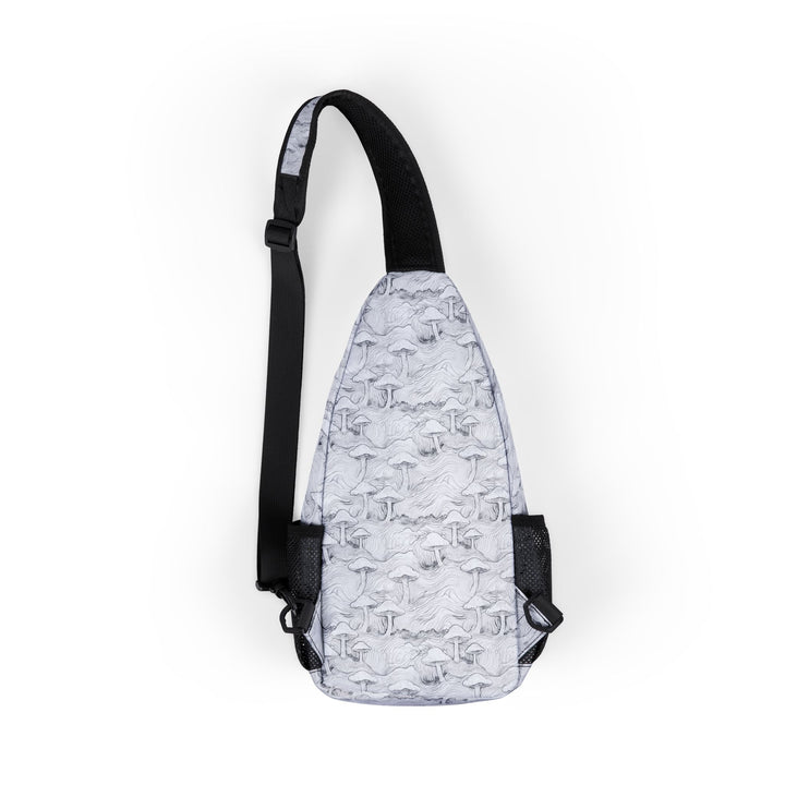 Back view of green psychedelic sling bag featuring forest mushrooms and sacred geometry pattern – MushForest design