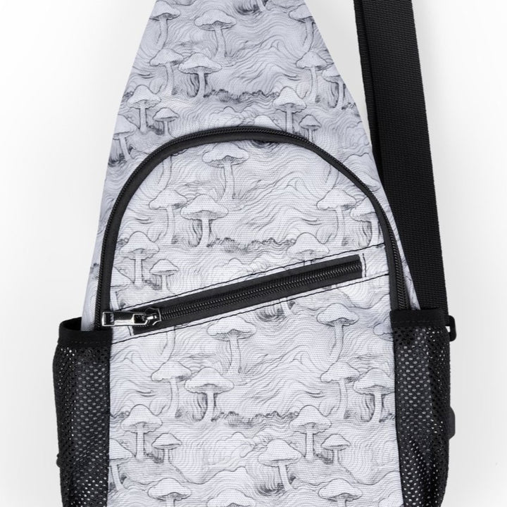 Close-up of MushForest sling bag print – visionary mushroom and forest elements in sacred geometry style