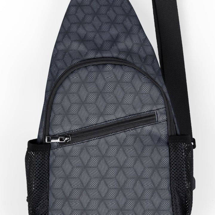 Close-up of Warpwave sling bag print – flowing geometry and psychedelic wave distortion details