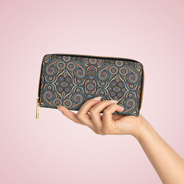 Psychedelic women’s wallet with dot swirl geometry – DotSwirl front view held in hand