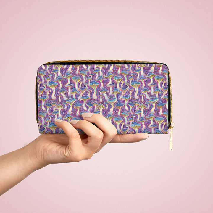 Side view of MUSHTRIP wallet – bold psychedelic mushroom trip pattern with detailed gold stitching
