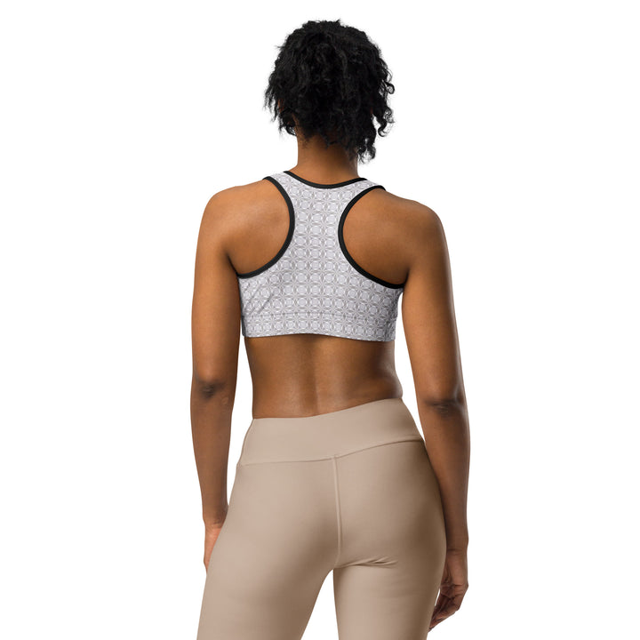 Back view of white-trim Netra bra – rave-ready sacred geometry workout top